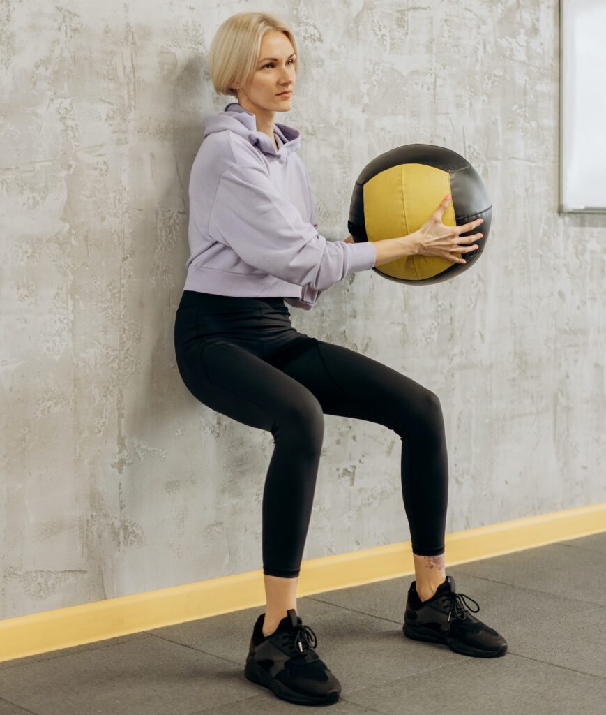 Weight loss exercises to do at home: wall squats.
